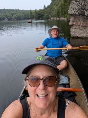 Christine and Rob in a canoe on a lake